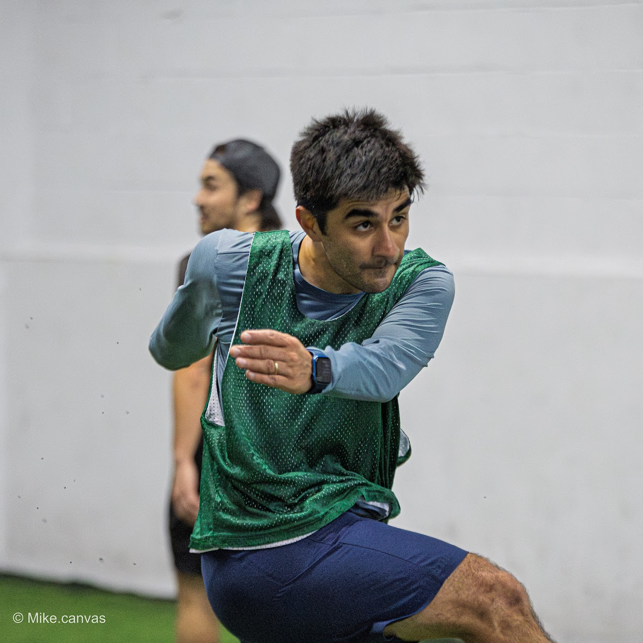 Players in action during Queens pickup soccer game